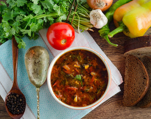 Bowl of traditional soup Borscht on table