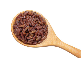 Cooked brown rice or riceberry rice attractive to eat  in wooden spoon isolated on white background.herb,cereal, top view and close up.Take photo at studio.