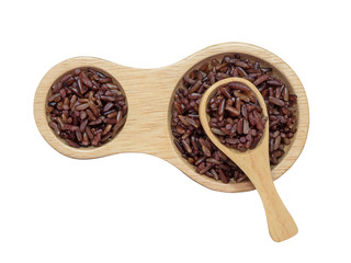 Cooked brown rice or riceberry rice attractive to eat  in wooden spoon and wooden bowl  isolated on white background.herb,cereal, top view and close up.Take photo at studio.