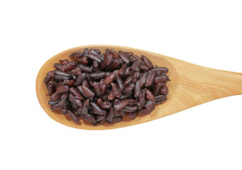 Cooked brown rice or riceberry rice attractive to eat  in wooden spoon isolated on white background.herb,cereal, top view and close up.Take photo at studio.