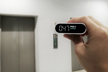 in door air quality check. measuring dust particles in the air. harmful PM 2.5 (particulate matter)...