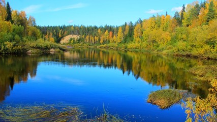 calm surface of the taiga river. autumn