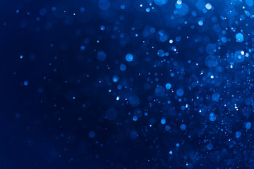 Abstract Blue bokeh defocus glitter blur background.