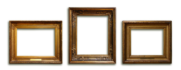 Set of three vintage golden baroque wooden frames on isolated background