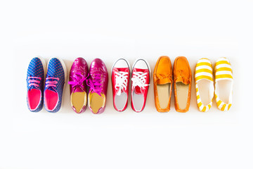 Collection of women's shoes on white background