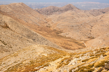 Greek Crete mountain range with highest mountain Ida Psiloritis, very dry hard terrain with sharp rocks and stones, natura park