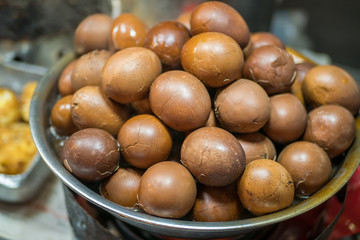 Close-up view of the chinese herbal tea eggs selling in the night market