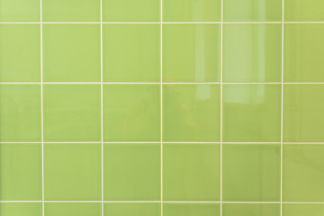 Bright green tile wall texture for background or interior