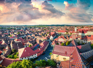 Aerial summer view of Tower of Council. Colorful cityscape of Sibiu town. Impressive sunset in...