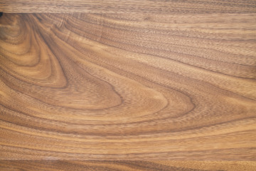 Texture of black walnut board with oil finish