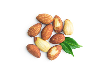 almonds with leaves in top view isolated on white background