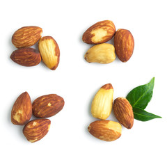almonds with leaves in top view isolated on white background