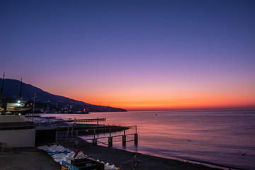 Obraz premium Beautiful sunrise over the Black Sea in Yalta, Crimea.
