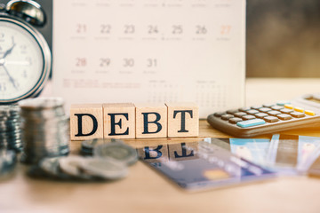 debt collection and tax season concept with deadline calendar remind note,coins,credit...