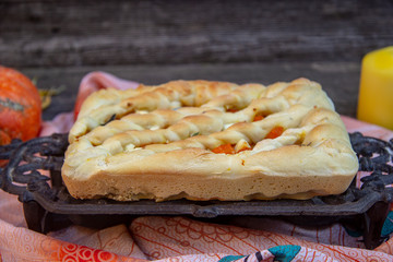 autumn pie with pumpkin and young cheese