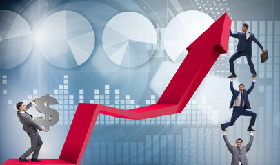 Fototapeta premium Businessman supporting growtn in economy on chart graph