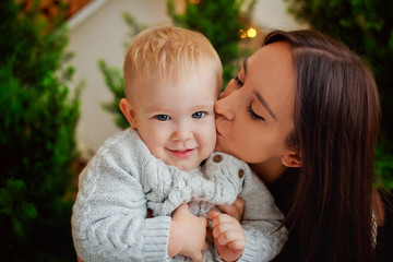 mother and son play at Christmas