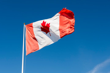 Naklejka na ściany i meble Canada Flag on Blue sky