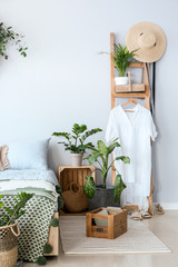 Interior of modern bedroom with houseplants
