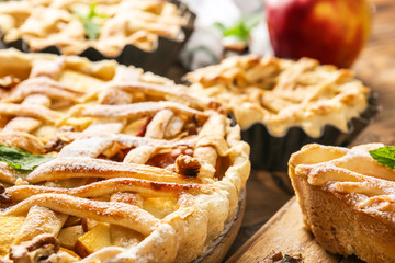Tasty apple pie on table, closeup