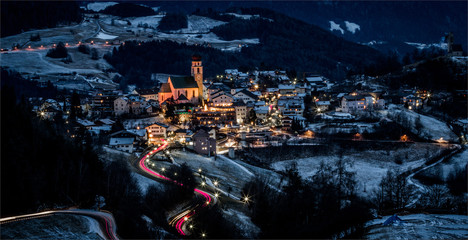 Detail of a small village in the province of Bolzano, in the mountains with snow.