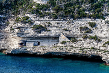 Old military facility built into the limestone rock in Bonifacio, Corsica, France.