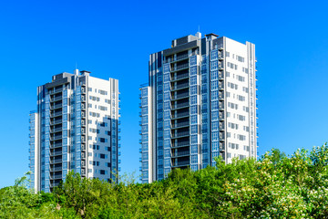Obraz na płótnie Canvas View on a new multistory high rise residential building