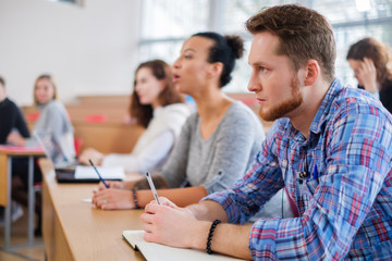 Multinational group of students in an auditorium