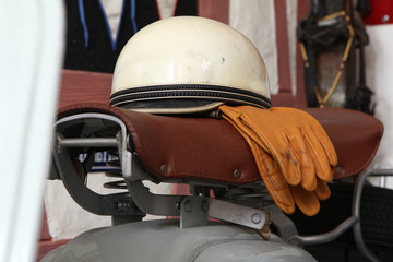 Old biker helmet and goggles