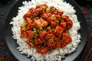 Tso's chicken with rice, green onion and broccoli
