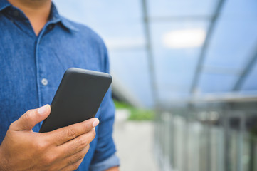 Close up hand using smartphone