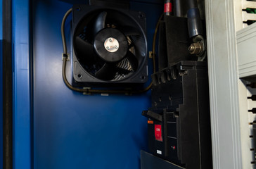 Low light view. lever for closing with opening. And the cooling fan in the electrical control...
