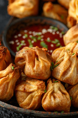 Chinese takeaway finger food Vegetable wontons with sweet chilli dip sauce