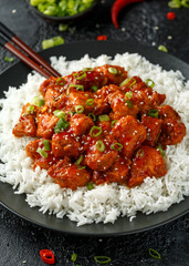 Tso's chicken with rice, green onion and broccoli