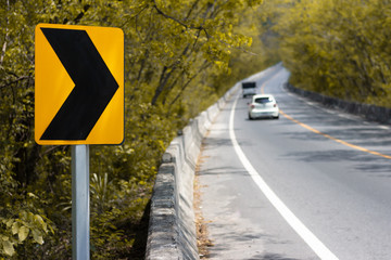 Pictures of white lines on the road surface that have Blurred images of cars driving up through the floor