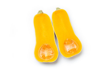 Two halves of an orange-yellow pumpkin on a white background.