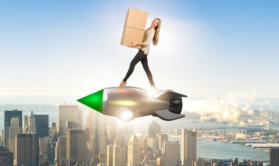 Woman in fast box delivery service on rocket