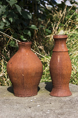 Fototapeta na wymiar Two rusty old pots