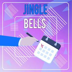 Conceptual hand writing showing Jingle Bells. Concept meaning Most famous traditional Christmas song all over the world Formal Suit Crosses Off Day Calendar Red Ink Ballpoint Pen