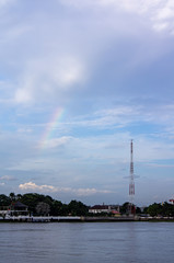 Rainbow on the Chao Phraya River with signal towers