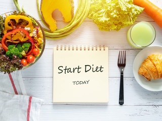 healthy eating, dieting, slimming and weight loss goals concept. target of diet plan on paper with...