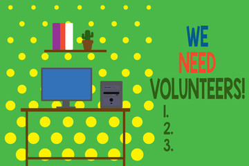 Conceptual hand writing showing We Need Volunteers. Concept meaning someone who does work without being paid for it Desktop computer with wooden table shelf books flower pot