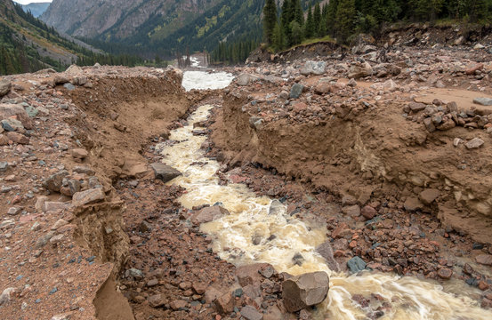 Riverbed after mudflow in the mountains; natural disasters concept