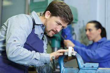 industrial metal machining worker in factory