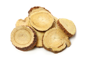 Licorice roots on white background