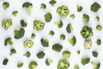 Broccoli pattern isolated on a white background. Various multiple parts of broccoli flower. Top...