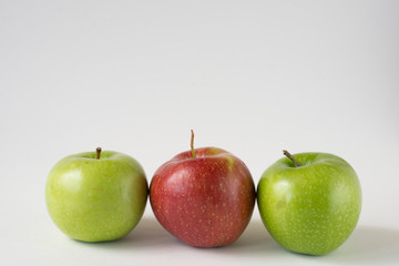 red and green apples with slices and leaves isolated on white background top view. Set or collection. Flat lay pattern