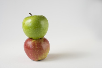 red and green apples with slices and leaves isolated on white background top view. Set or collection. Flat lay pattern