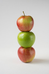 red and green apples with slices and leaves isolated on white background top view. Set or collection. Flat lay pattern