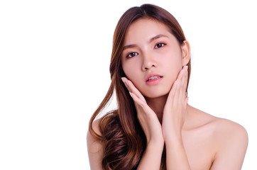 Fototapeta premium asian young beautiful woman smiling and touching her face, isolated over white background. natural makeup, SPA therapy, skincare, cosmetology and plastic surgery concept